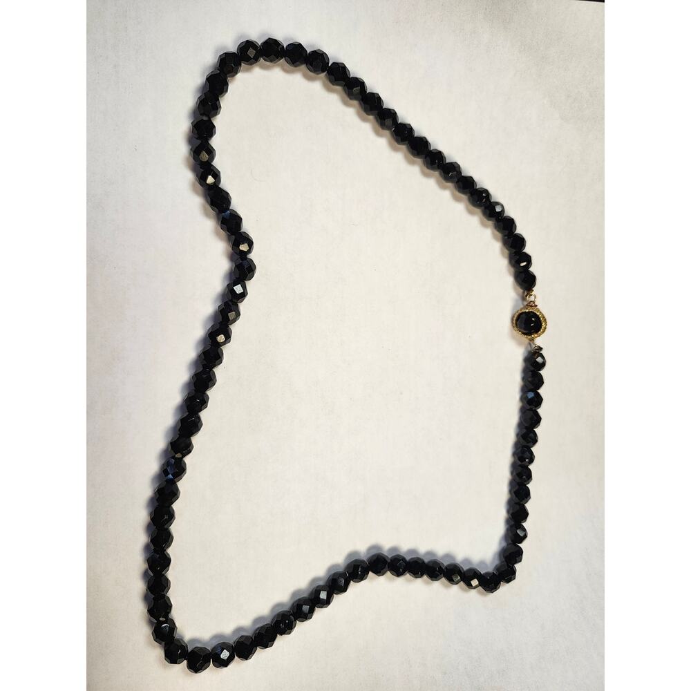 Vintage unsigned black faceted glass bead necklace 22..5"